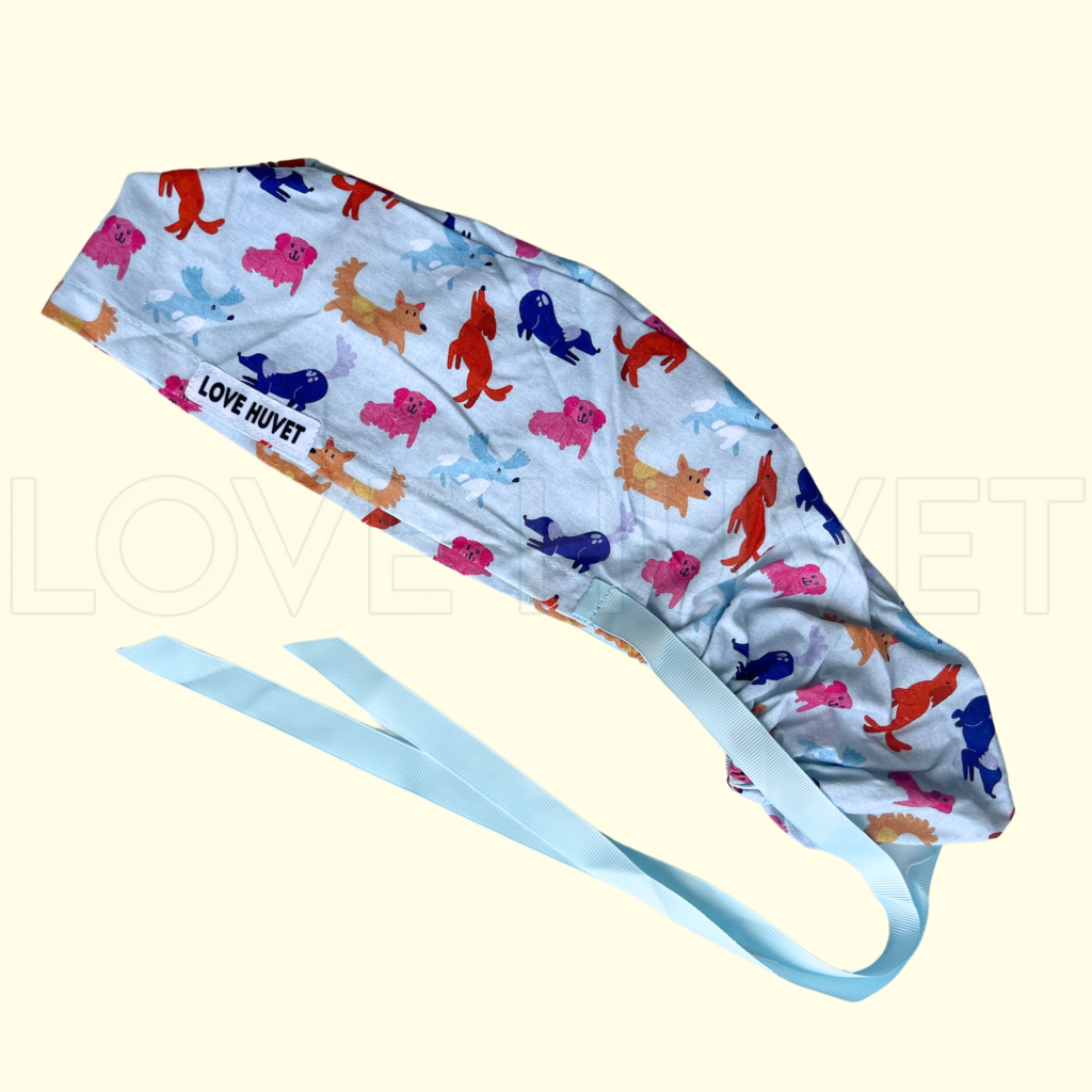 Ponytail Playful Pups Scrub Cap | Love Huvet